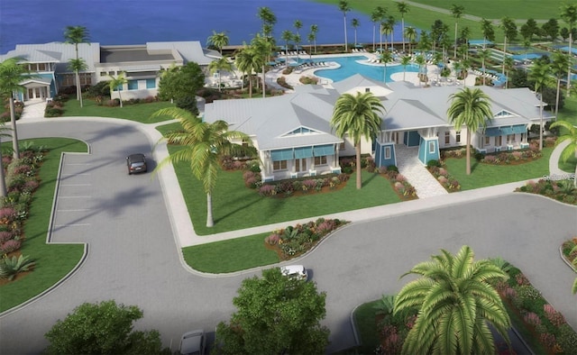 birds eye view of property with a water view