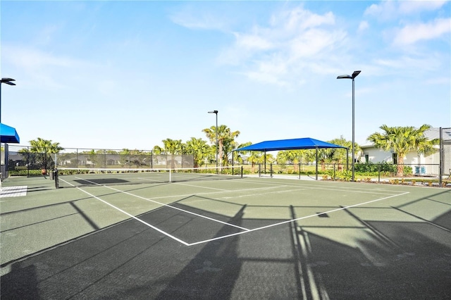 view of sport court with fence and community basketball court