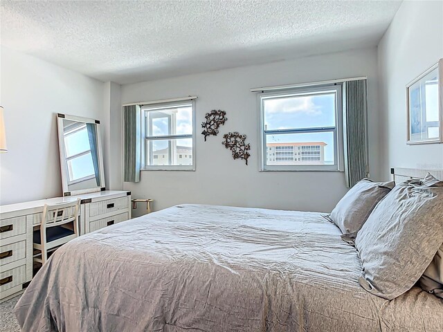 1255 Tarpon Center Dr Unit 503, Venice, FL 34285 - bedroom featuring a textured ceiling