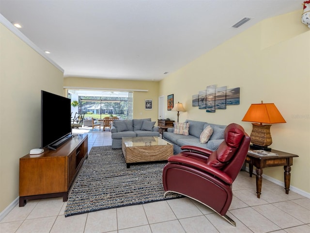 living area with light tile patterned floors, baseboards, and visible vents