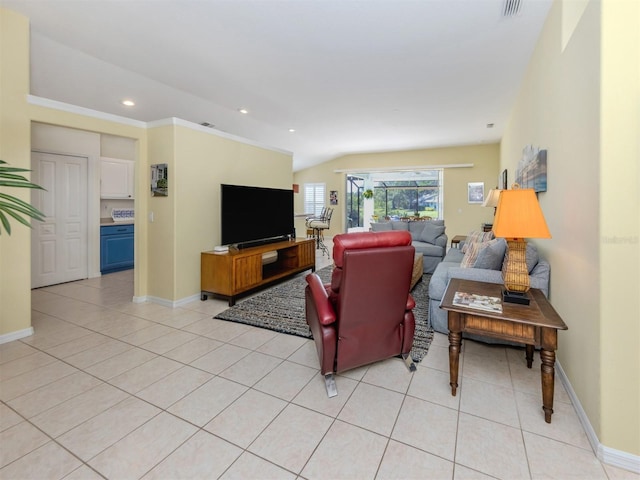 living room featuring light tile patterned floors, visible vents, baseboards, and recessed lighting