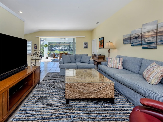 living room with tile patterned flooring, vaulted ceiling, and recessed lighting