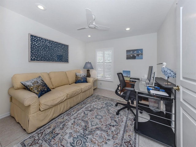 office space with light tile patterned floors, a ceiling fan, recessed lighting, and baseboards