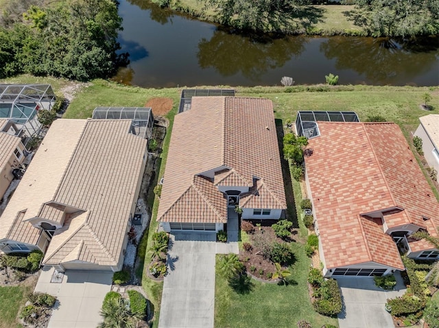 drone / aerial view with a water view