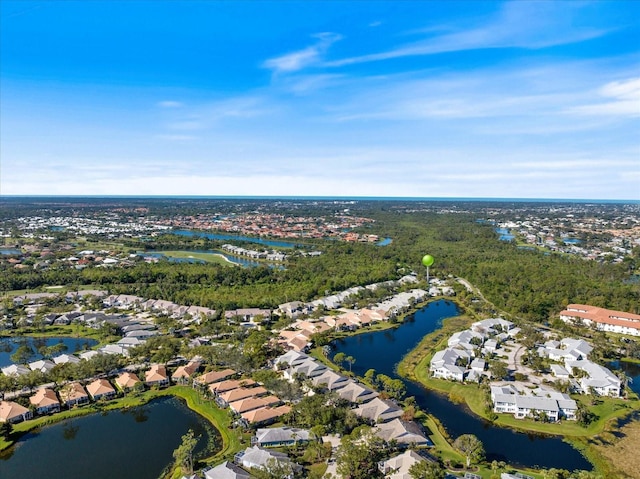 aerial view featuring a residential view and a water view