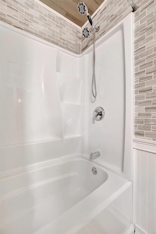 bathroom with shower / bathing tub combination