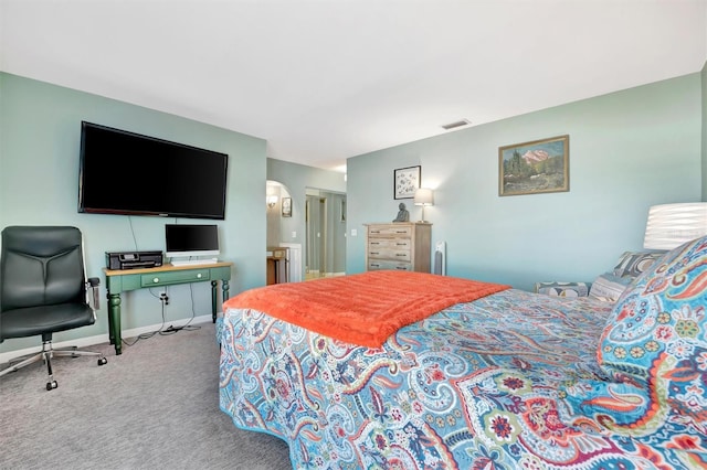 bedroom featuring baseboards, carpet floors, and visible vents