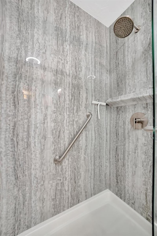 bathroom featuring walk in shower