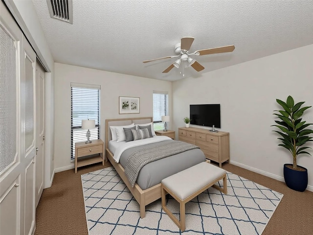 1602 Jim Jim Ct, Venice, FL 34293 - bedroom featuring a closet, light carpet, a textured ceiling, and ceiling fan