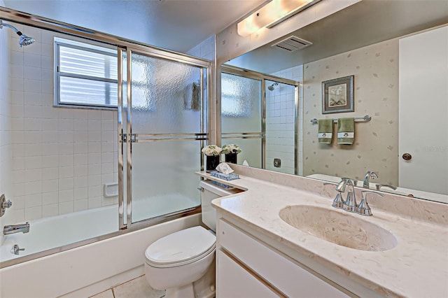 full bathroom with visible vents, wallpapered walls, toilet, enclosed tub / shower combo, and vanity