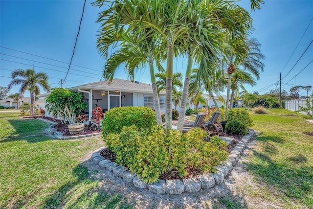 view of yard with a sunroom