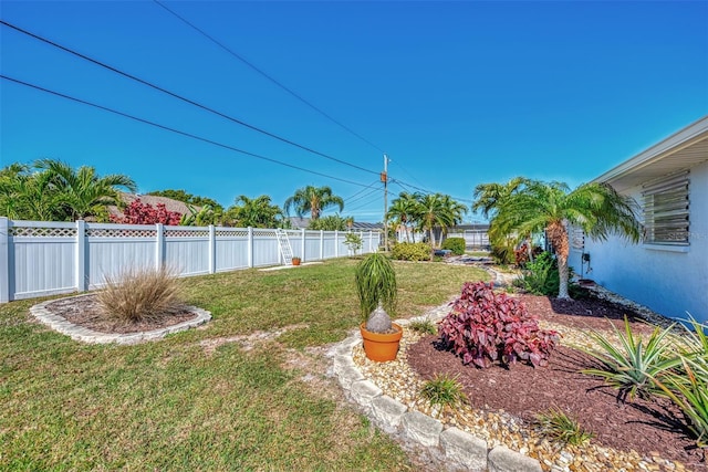 view of yard with fence