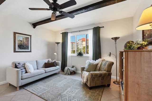 living room with beam ceiling, light tile patterned floors, and baseboards