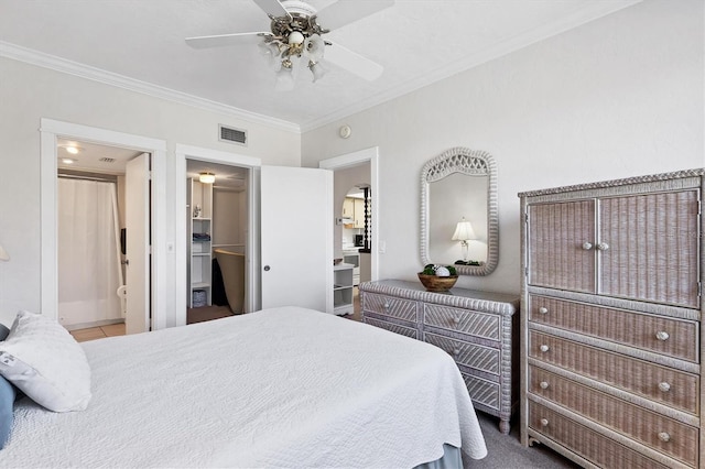 tiled bedroom with connected bathroom, visible vents, ornamental molding, and a ceiling fan