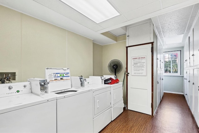 shared laundry area with washer and clothes dryer and dark wood-type flooring