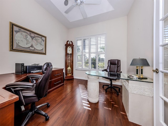 office area featuring baseboards, lofted ceiling, ceiling fan, and wood finished floors