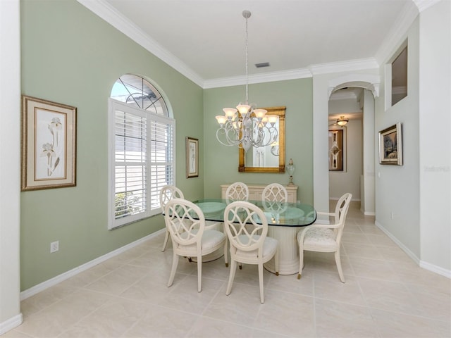 dining area with visible vents, a notable chandelier, light tile patterned flooring, crown molding, and baseboards