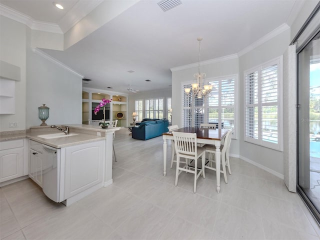 dining area featuring visible vents, built in shelves, crown molding, baseboards, and a notable chandelier