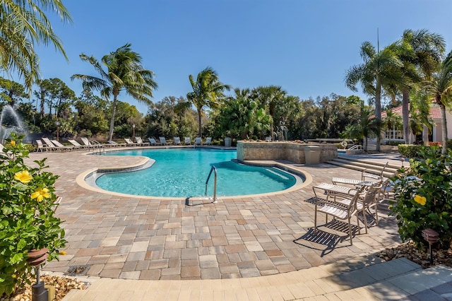 pool featuring a patio area