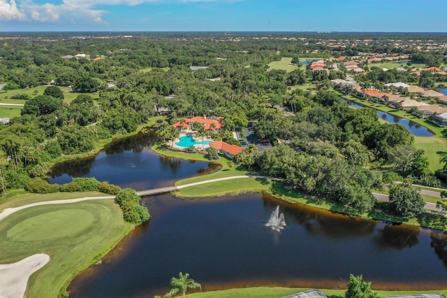 aerial view with view of golf course and a water view