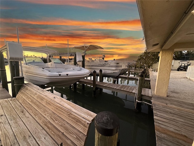 view of dock with boat lift