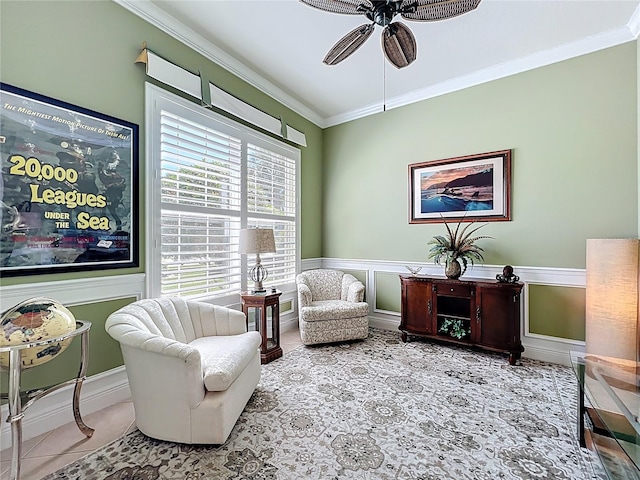 23901 Waverly Cir, Venice, FL 34293 - sitting room with ornamental molding, a ceiling fan, and a wainscoted wall