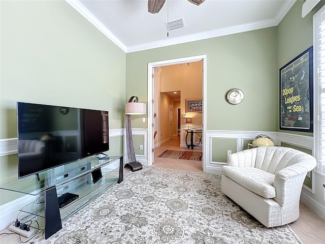 23901 Waverly Cir, Venice, FL 34293 - tiled living room featuring ornamental molding, ceiling fan, and wainscoting
