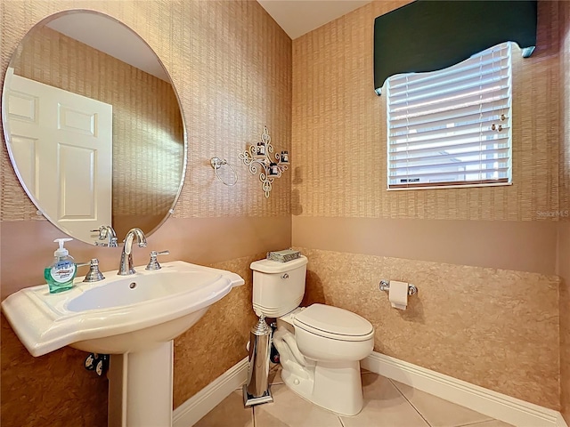 23901 Waverly Cir, Venice, FL 34293 - half bathroom with tile patterned flooring, toilet, and baseboards