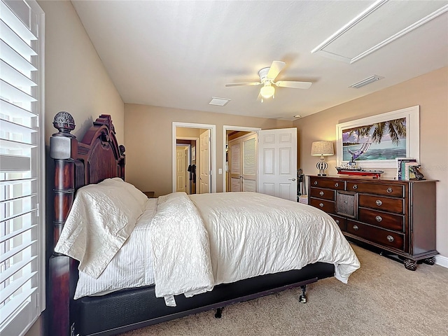 23901 Waverly Cir, Venice, FL 34293 - carpeted bedroom featuring ceiling fan and attic access