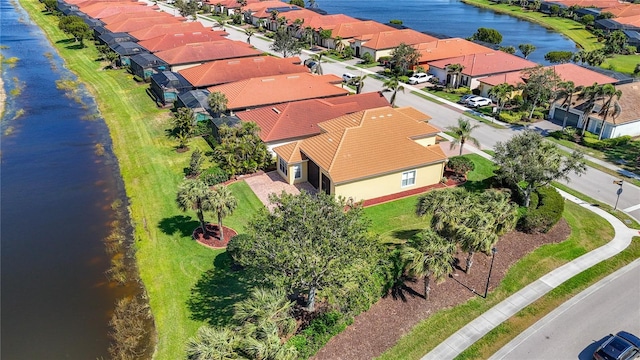 23901 Waverly Cir, Venice, FL 34293 - aerial view of residential area featuring a nearby body of water