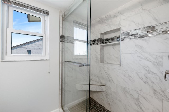 bathroom featuring a stall shower