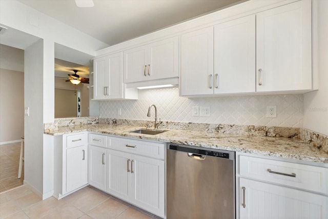 kitchen with white cabinetry, light tile patterned flooring, ceiling fan, a sink, and dishwasher