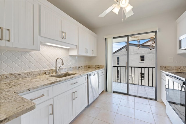 990 Bird Bay Way Unit 258, Venice, FL 34285 - kitchen with dishwasher, white electric range oven, backsplash, white cabinetry, and a ceiling fan
