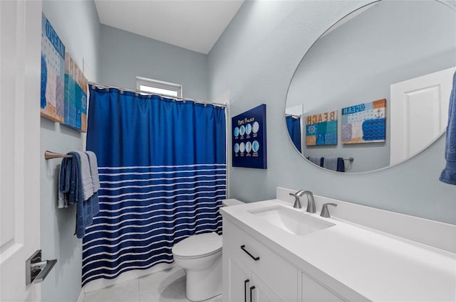 bathroom featuring a shower with shower curtain, toilet, vanity, and tile patterned flooring