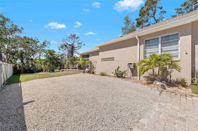 view of yard with a patio and fence