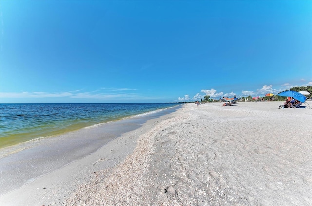 property view of water with a beach view