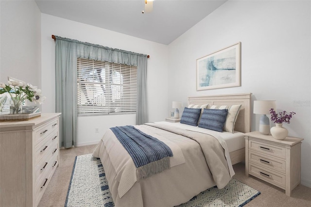 bedroom with light colored carpet