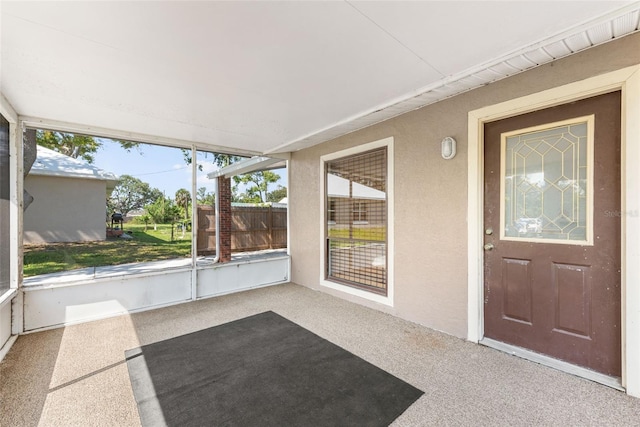 doorway to property with stucco siding