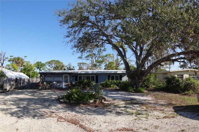 view of front of house with fence