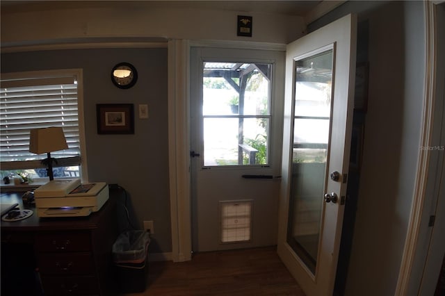 doorway to outside featuring wood finished floors