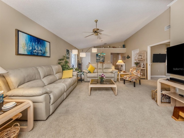 carpeted living area featuring vaulted ceiling, ceiling fan, and visible vents