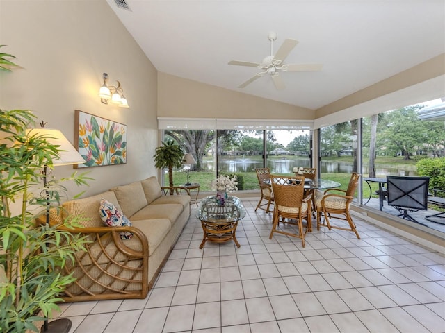 sunroom / solarium featuring a water view and visible vents