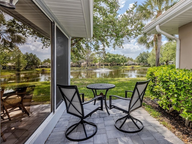 view of patio / terrace featuring a water view