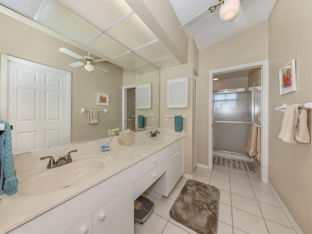 bathroom with tile patterned flooring, a sink, a shower with door, and double vanity