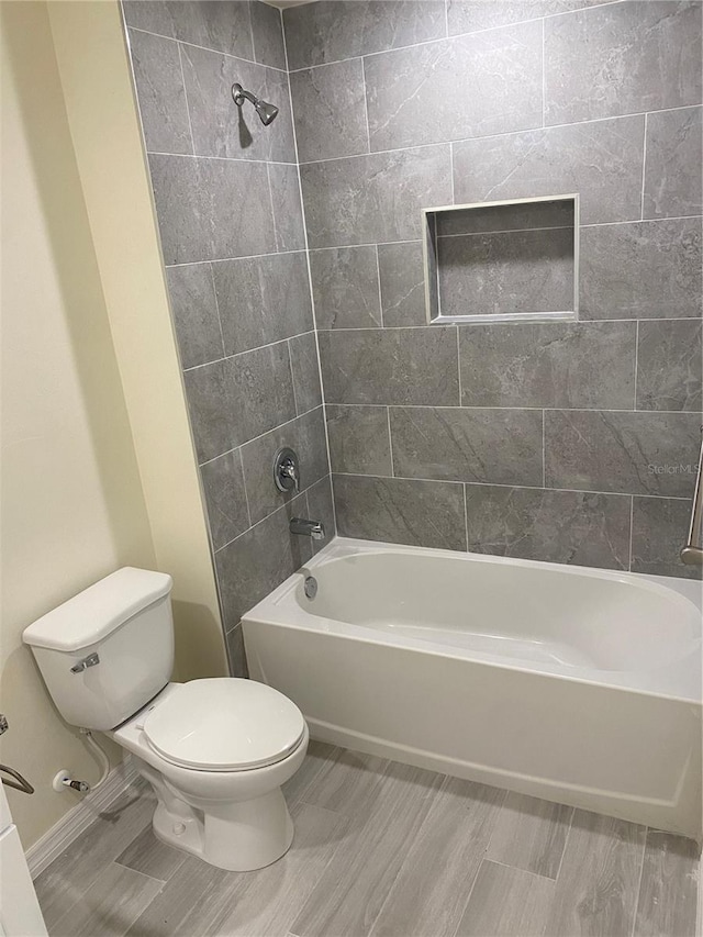 full bath with toilet and shower / bathing tub combination