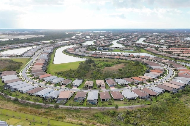 aerial view featuring a residential view and a water view