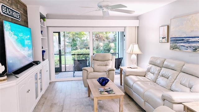 living room with light wood-style floors and ceiling fan