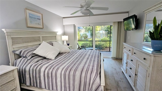 bedroom featuring access to exterior, a ceiling fan, and light wood finished floors