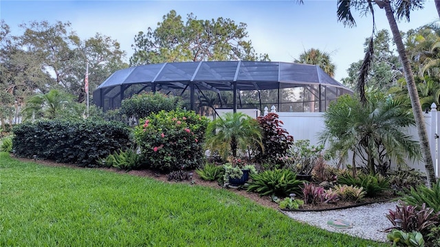 view of yard with a lanai