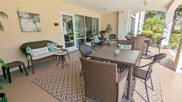 view of patio / terrace featuring outdoor dining space and outdoor lounge area